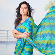 Blue sequined chiffon saree occasion wear