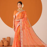 Laxmipati Ruchi Orange Chiffon Embroidered Saree