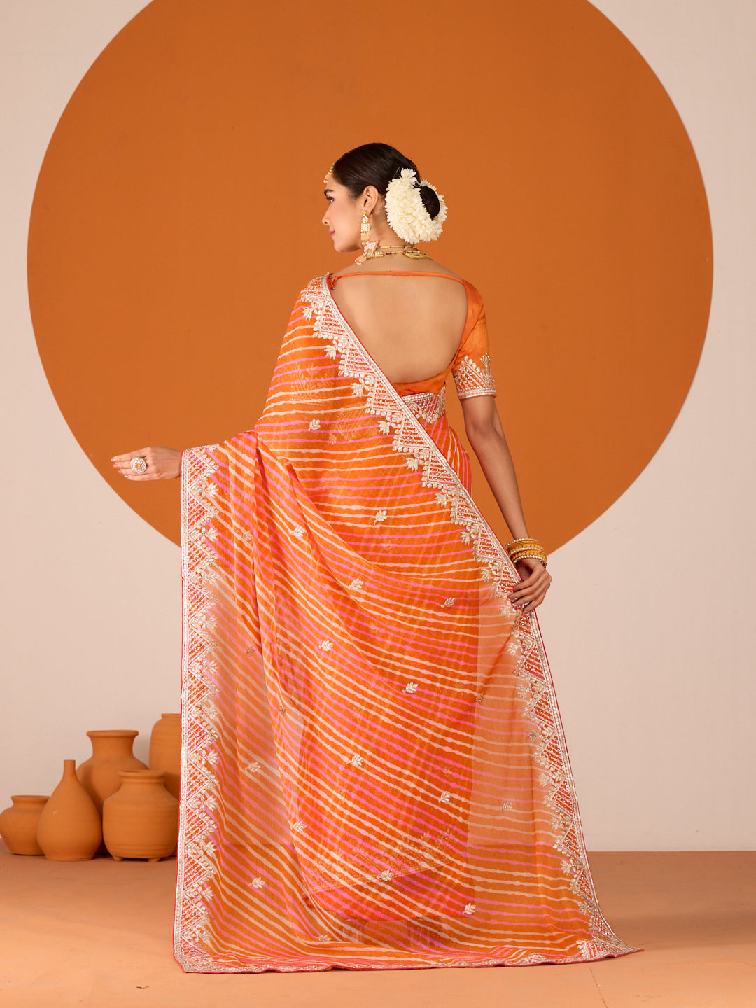 Laxmipati Ruchi Orange Chiffon Embroidered Saree