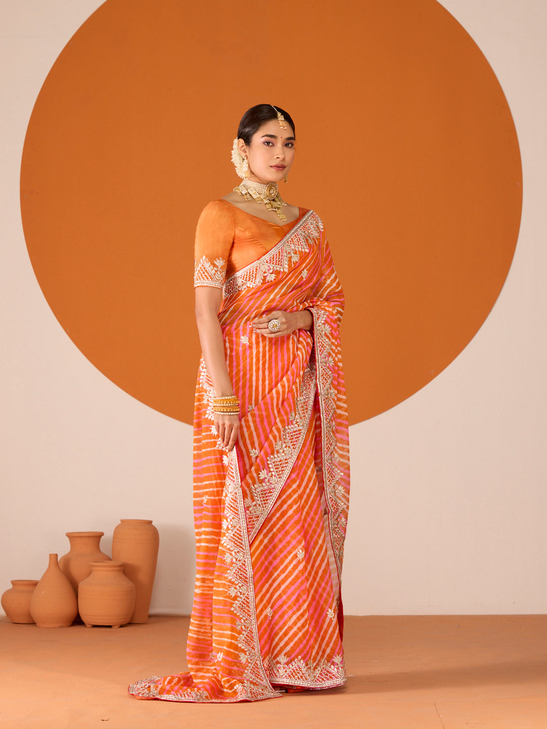 Laxmipati Ruchi Orange Chiffon Embroidered Saree