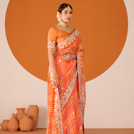 Laxmipati Ruchi Orange Chiffon Embroidered Saree