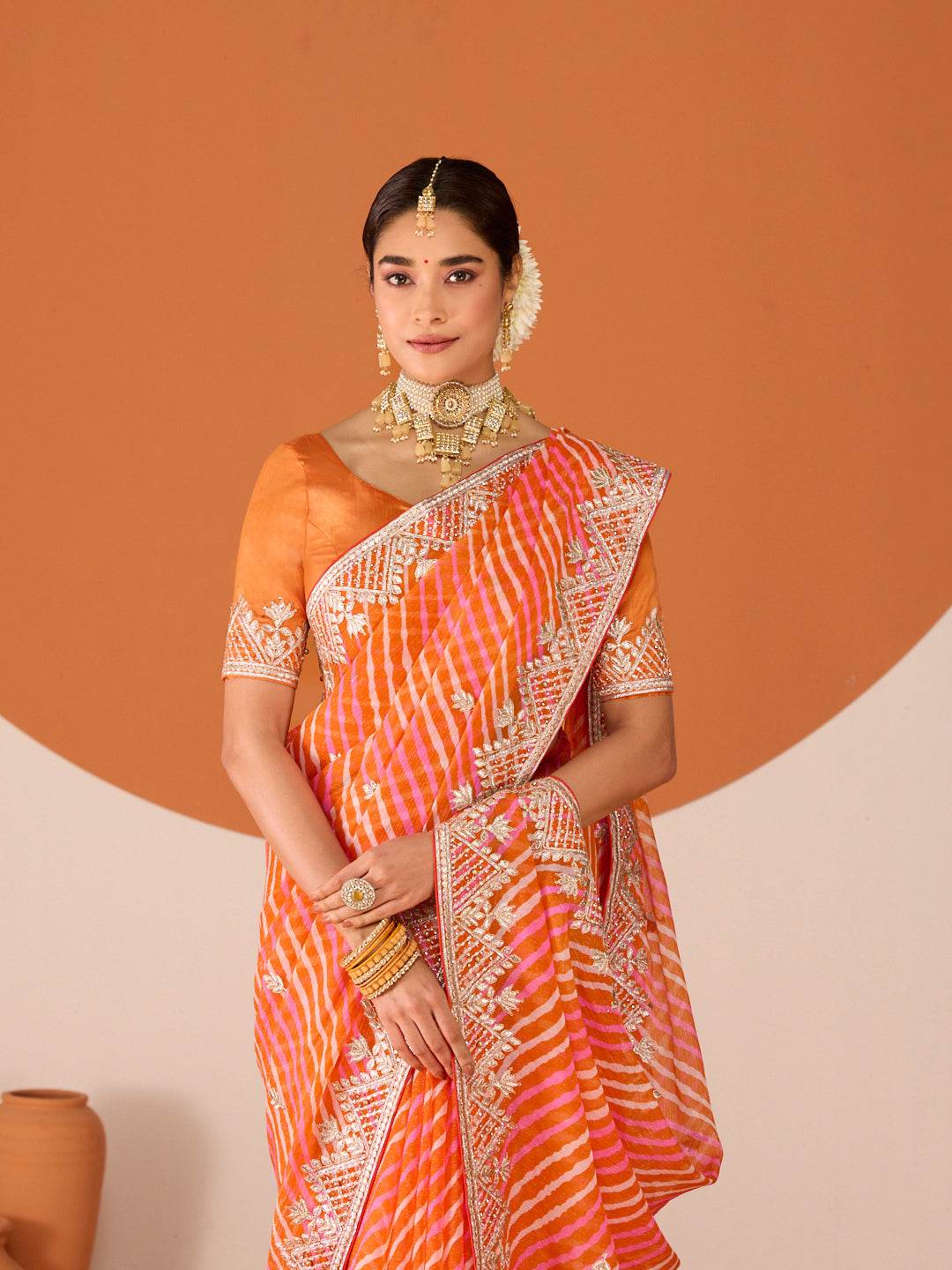 Laxmipati Ruchi Orange Chiffon Embroidered Saree