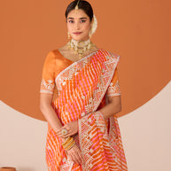 Laxmipati Ruchi Orange Chiffon Embroidered Saree
