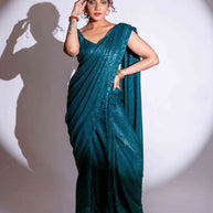 Blue sequin embroidered georgette saree wedding wear
