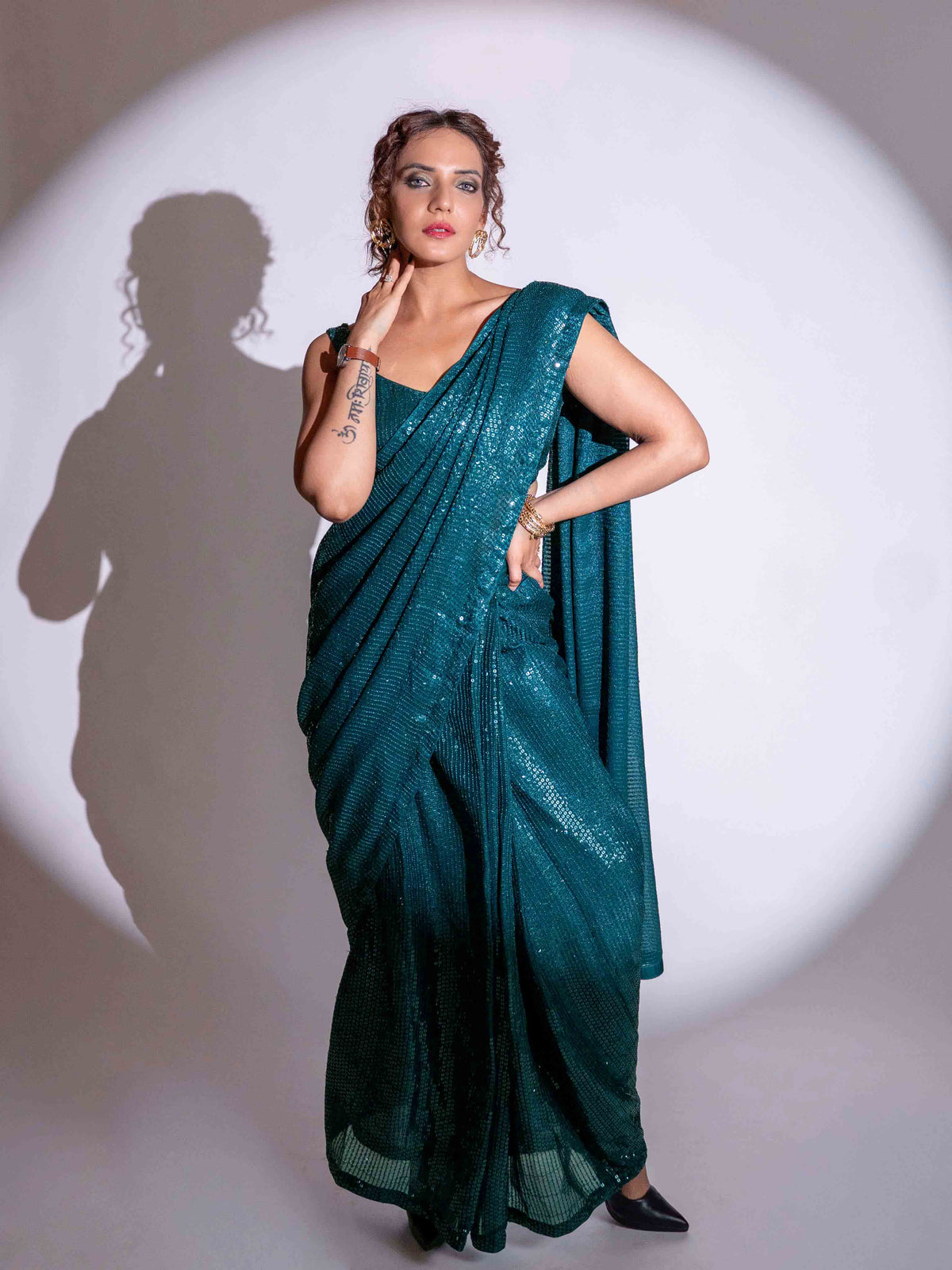 Blue sequin embroidered georgette saree party wear
