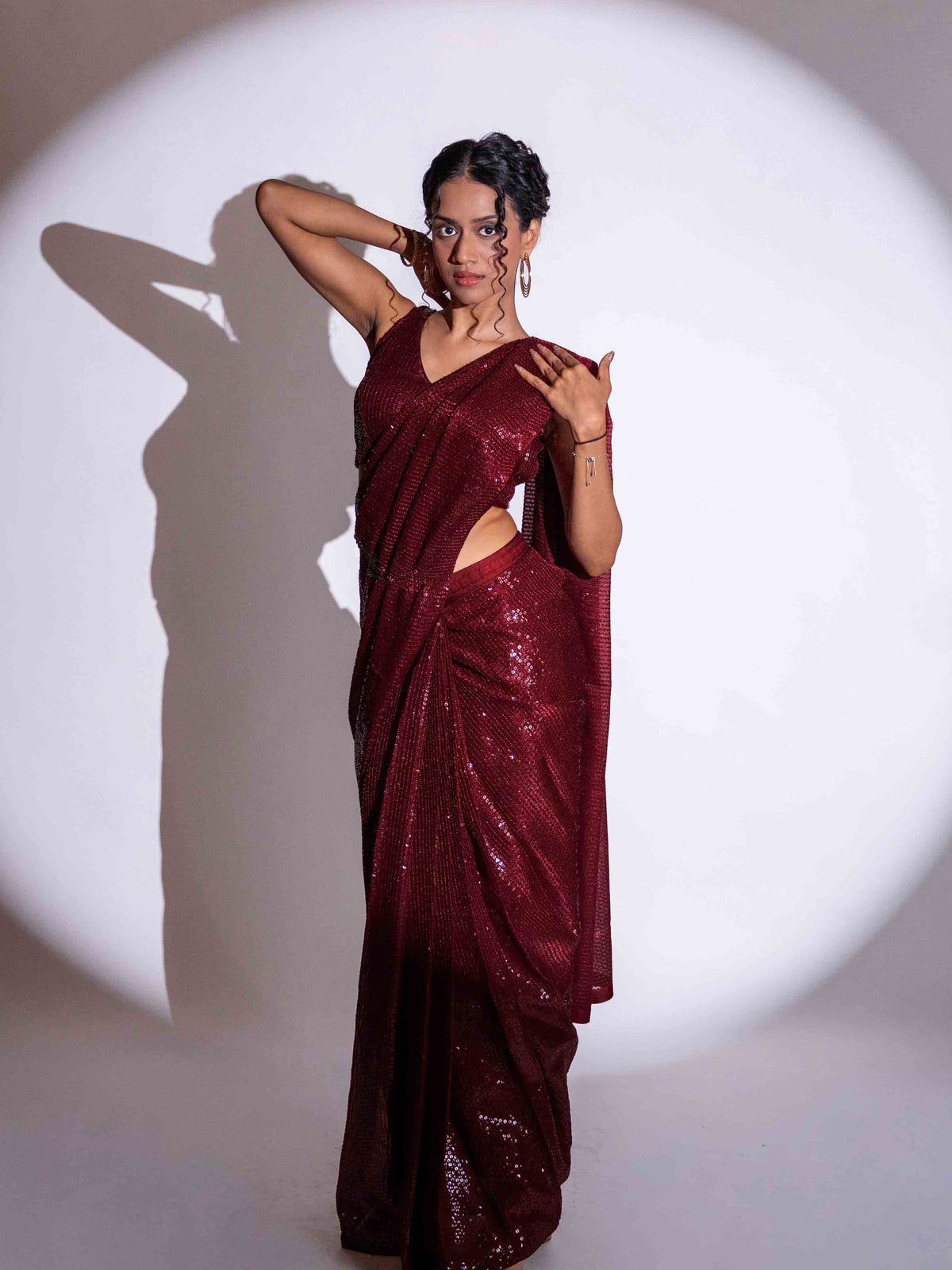 Maroon sequin embroidered georgette saree festive wear
