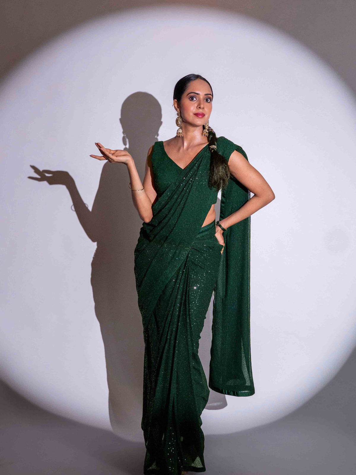 Green sequin embroidered georgette saree festive wear
