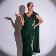 Green sequin embroidered georgette saree festive wear
