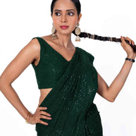 Green sequin embroidered georgette saree wedding wear

