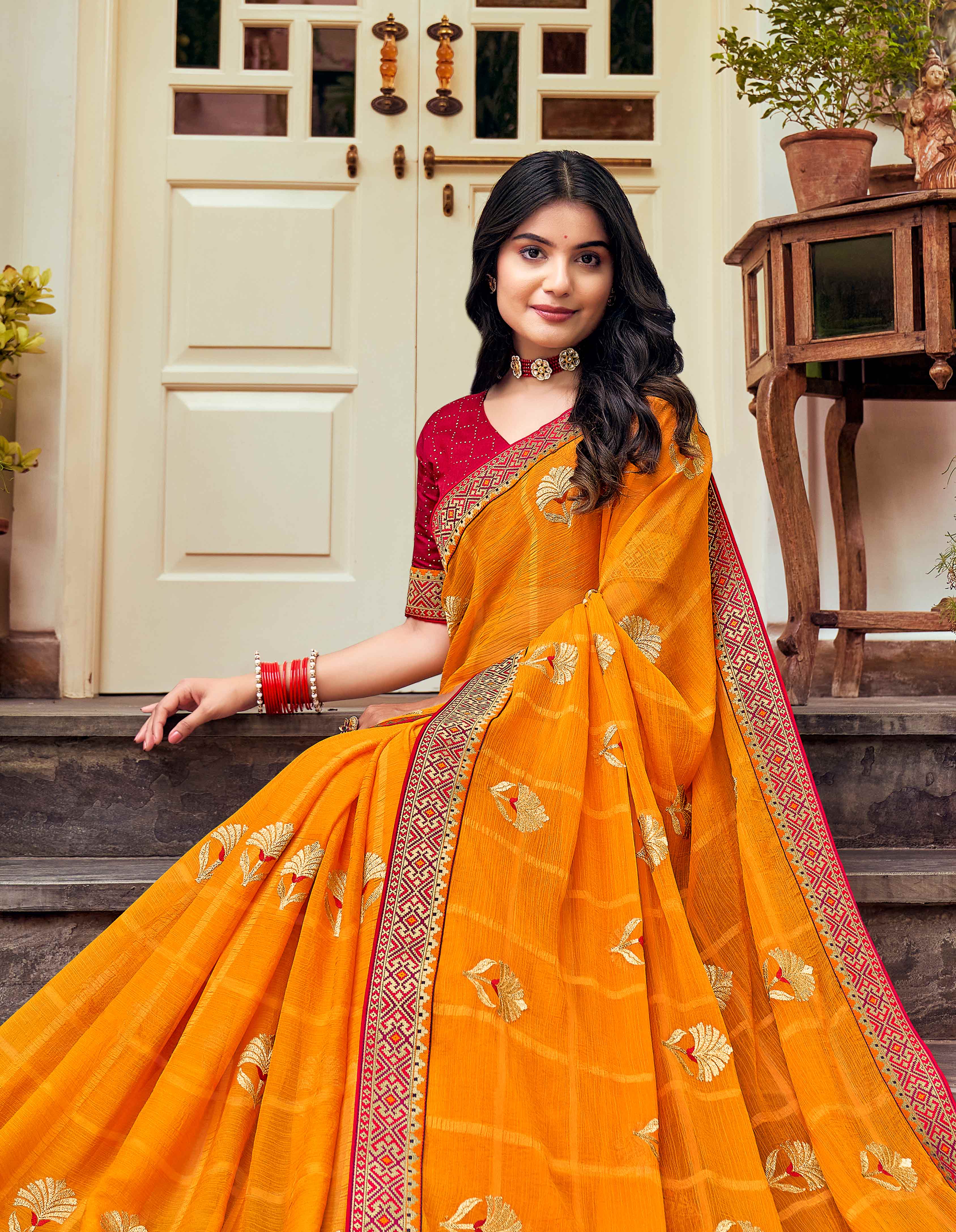 Laxmipati Ajrakh Floral Zari Motifs along with Brocade Border Chiffon Saree in Orange Color with Unstitched Blouse