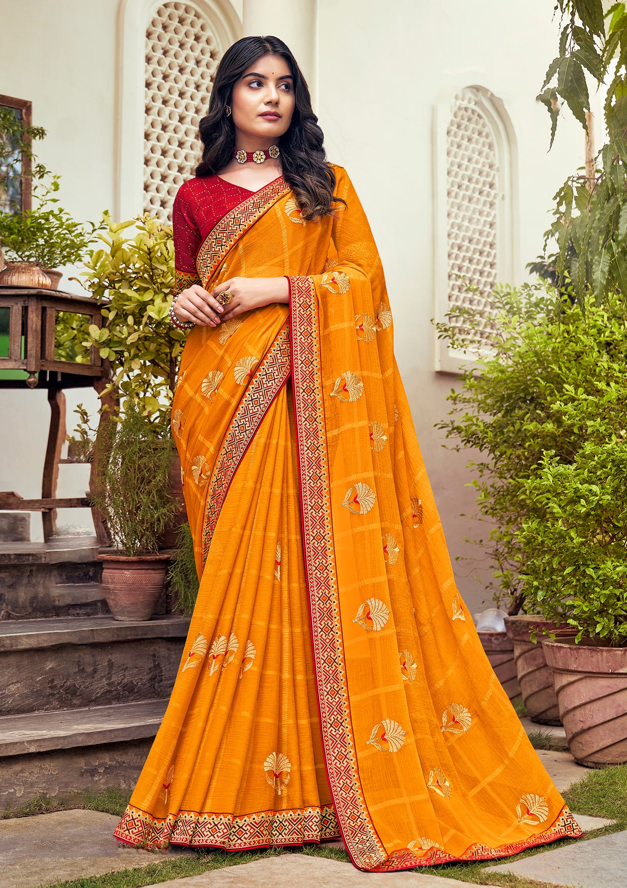 Laxmipati Ajrakh Floral Zari Motifs along with Brocade Border Chiffon Saree in Orange Color with Unstitched Blouse