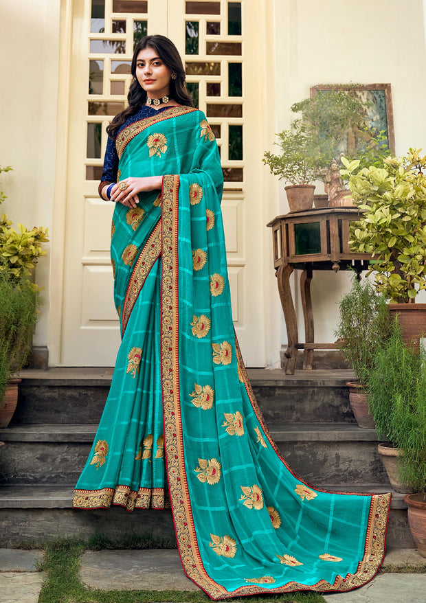 Laxmipati Ajrakh Floral Zari Motifs along with Brocade Border Chiffon Saree in Turquoise Blue Color with Unstitched Blouse