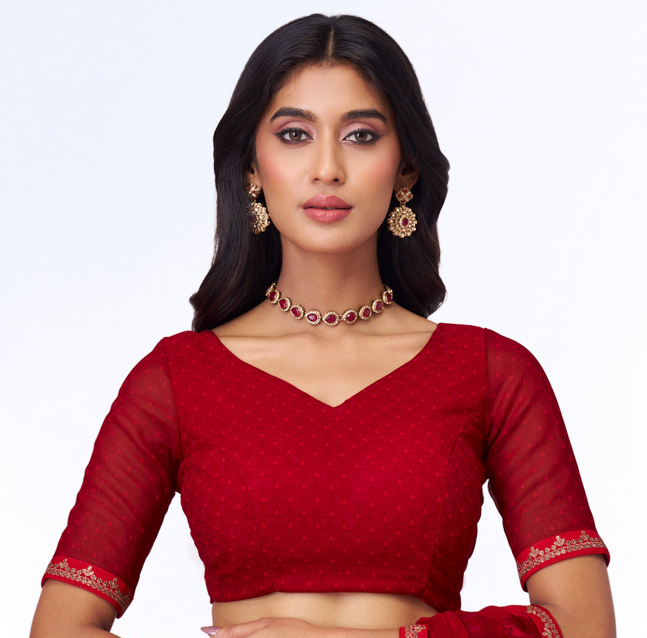 Red abstract printed georgette saree festive wear
