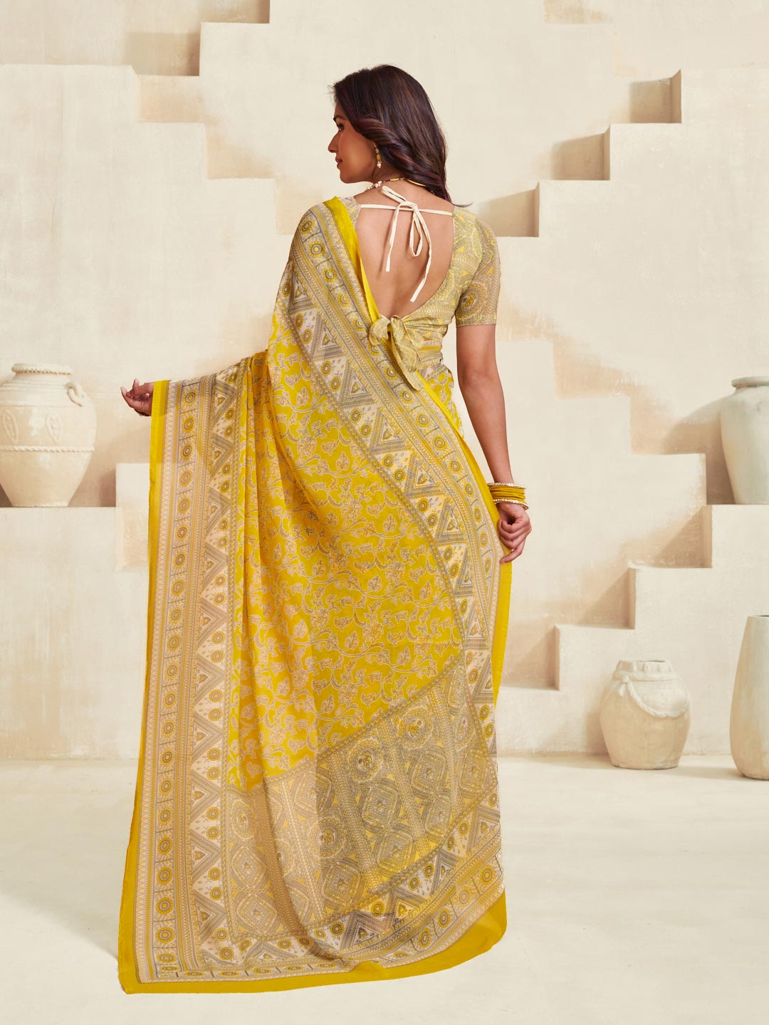 Yellow trendy georgette saree