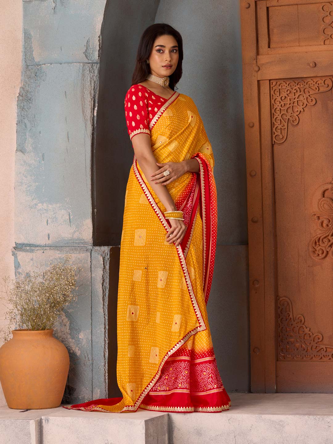 Mustard bandhani printed silk blend saree wedding wear