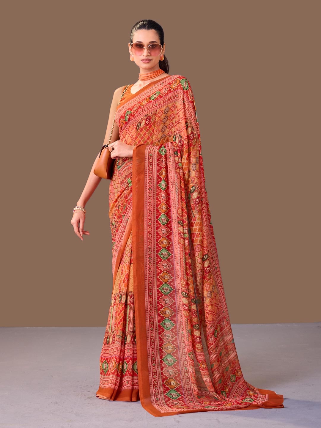 Laxmipati Dillagi Orange Georgette Floral Saree