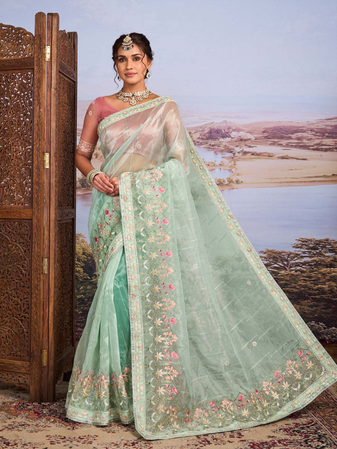 Green floral embroidered tissue organza saree festive wear