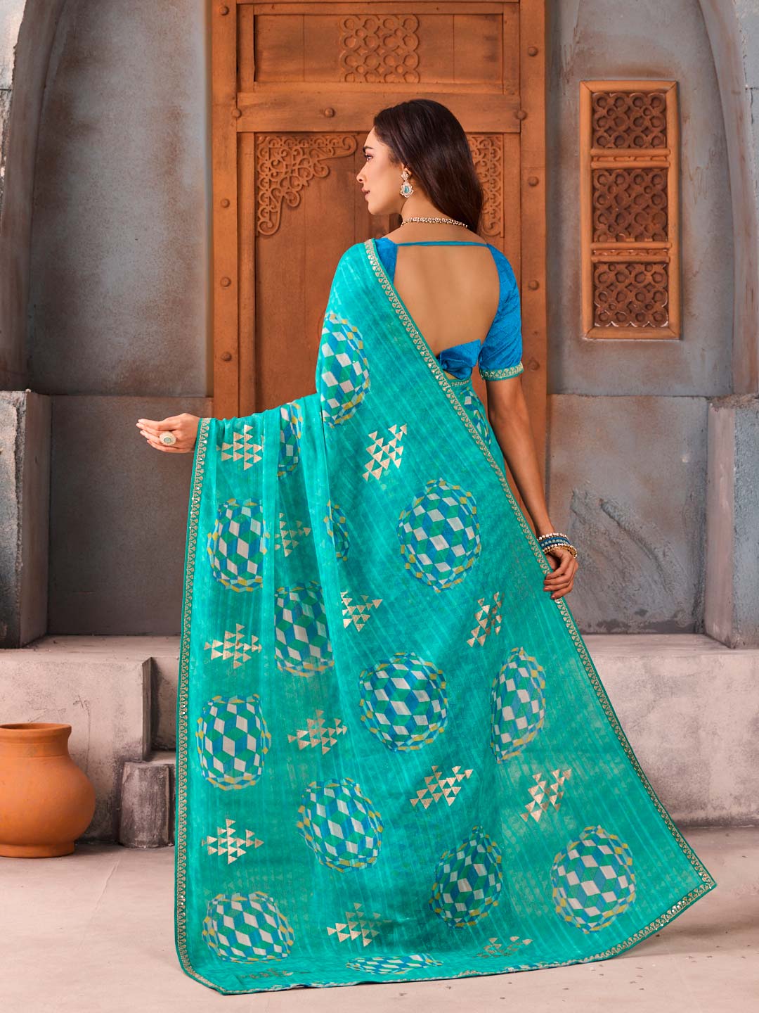 Blue geometric embellished chiffon saree festive wear