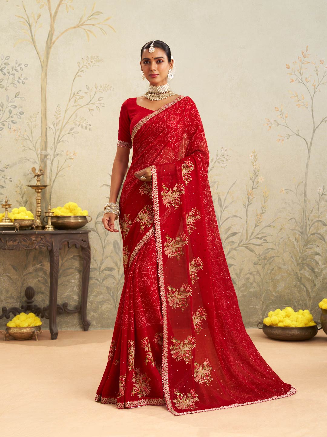 Red embroidered chiffon saree festive wear