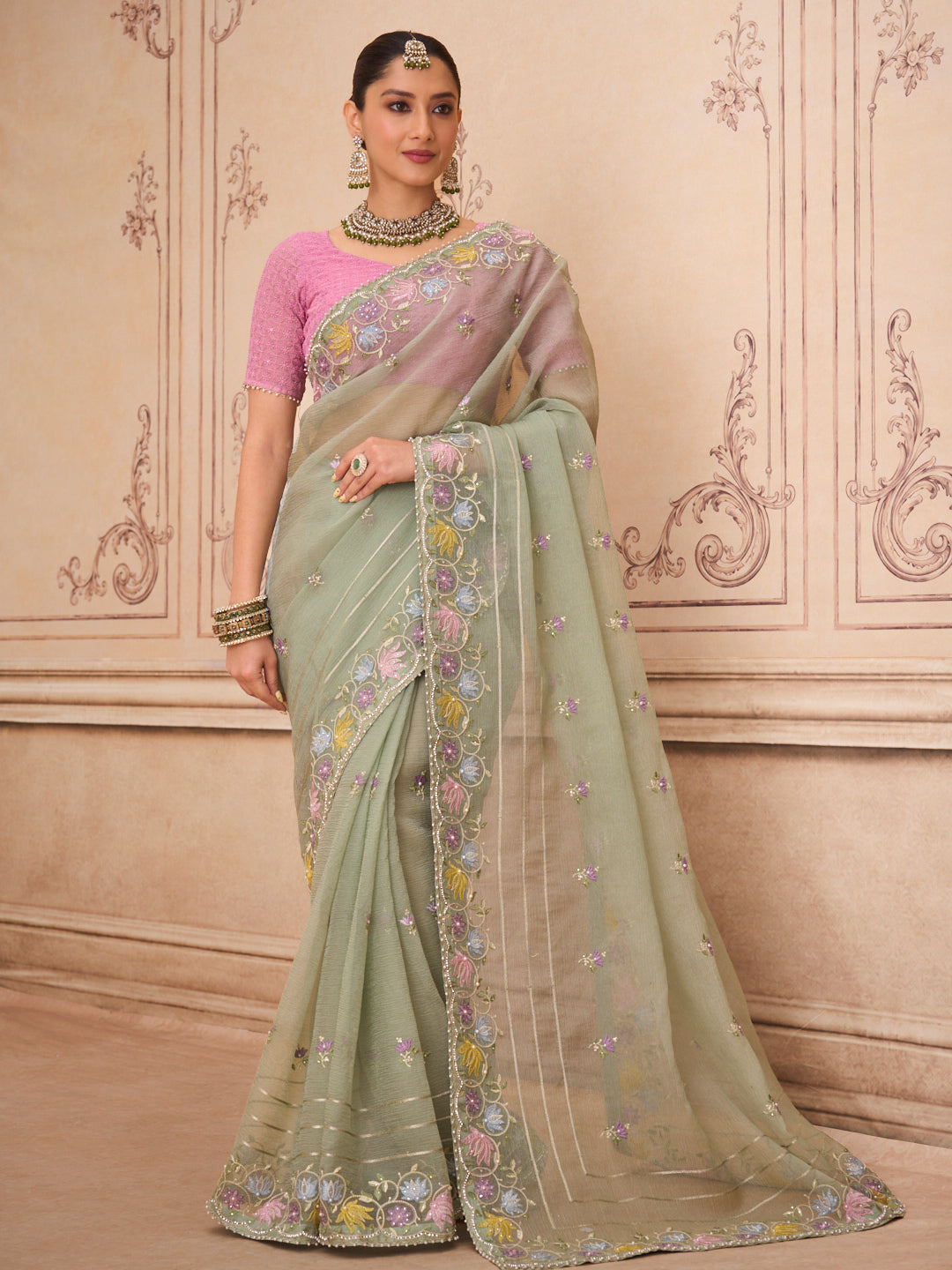 Green embroidered tissue organza saree festive wear