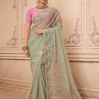 Green embroidered tissue organza saree festive wear