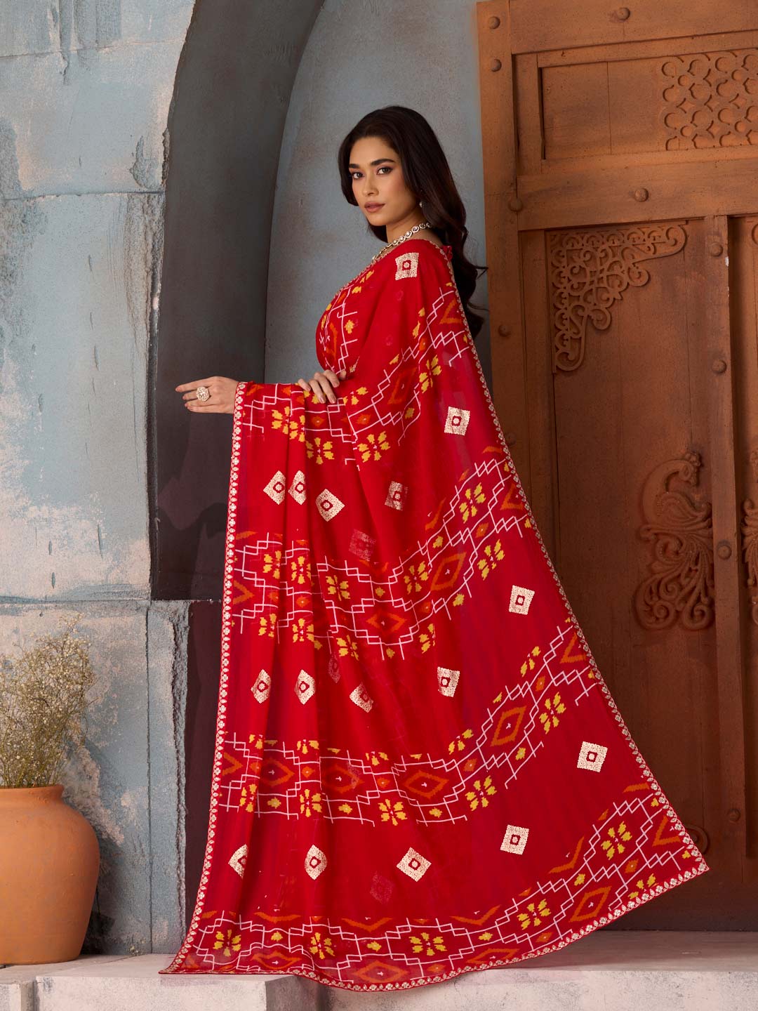Red bandhani-style printed georgette saree daily wear