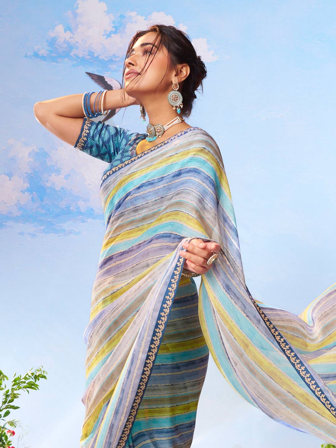 Blue sequined georgette saree wedding wear 