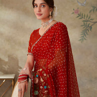 Red embroidered chiffon saree festive wear