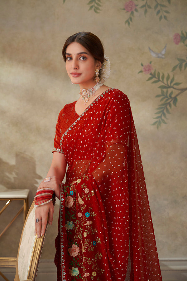 Red embroidered chiffon saree festive wear