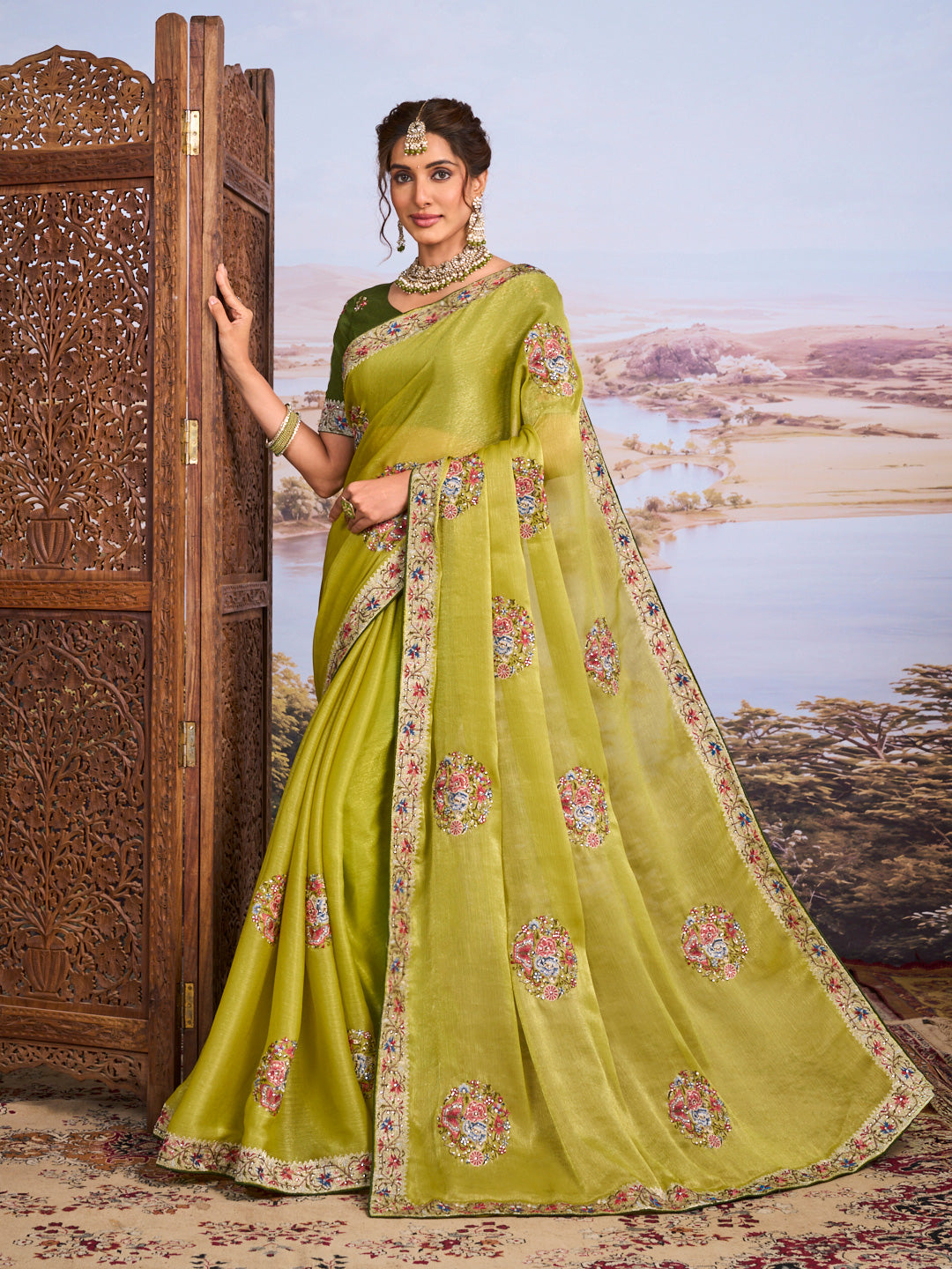 Green floral embroidered chiffon saree festive wear