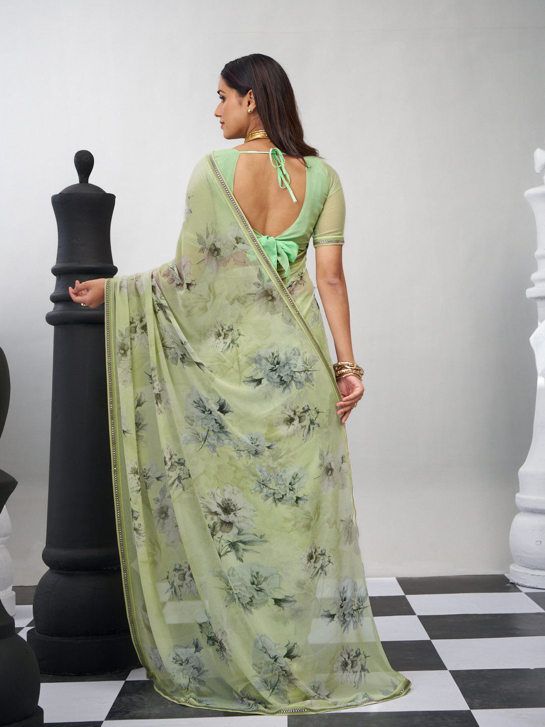 Green trendy floral saree