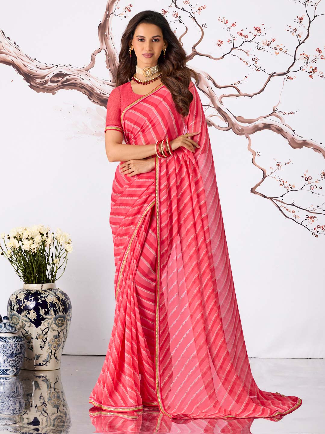 Pink striped georgette saree party wear