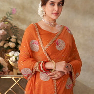 Orange embroidered chiffon saree festive wear