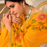 Yellow embroidered chiffon saree daily wear