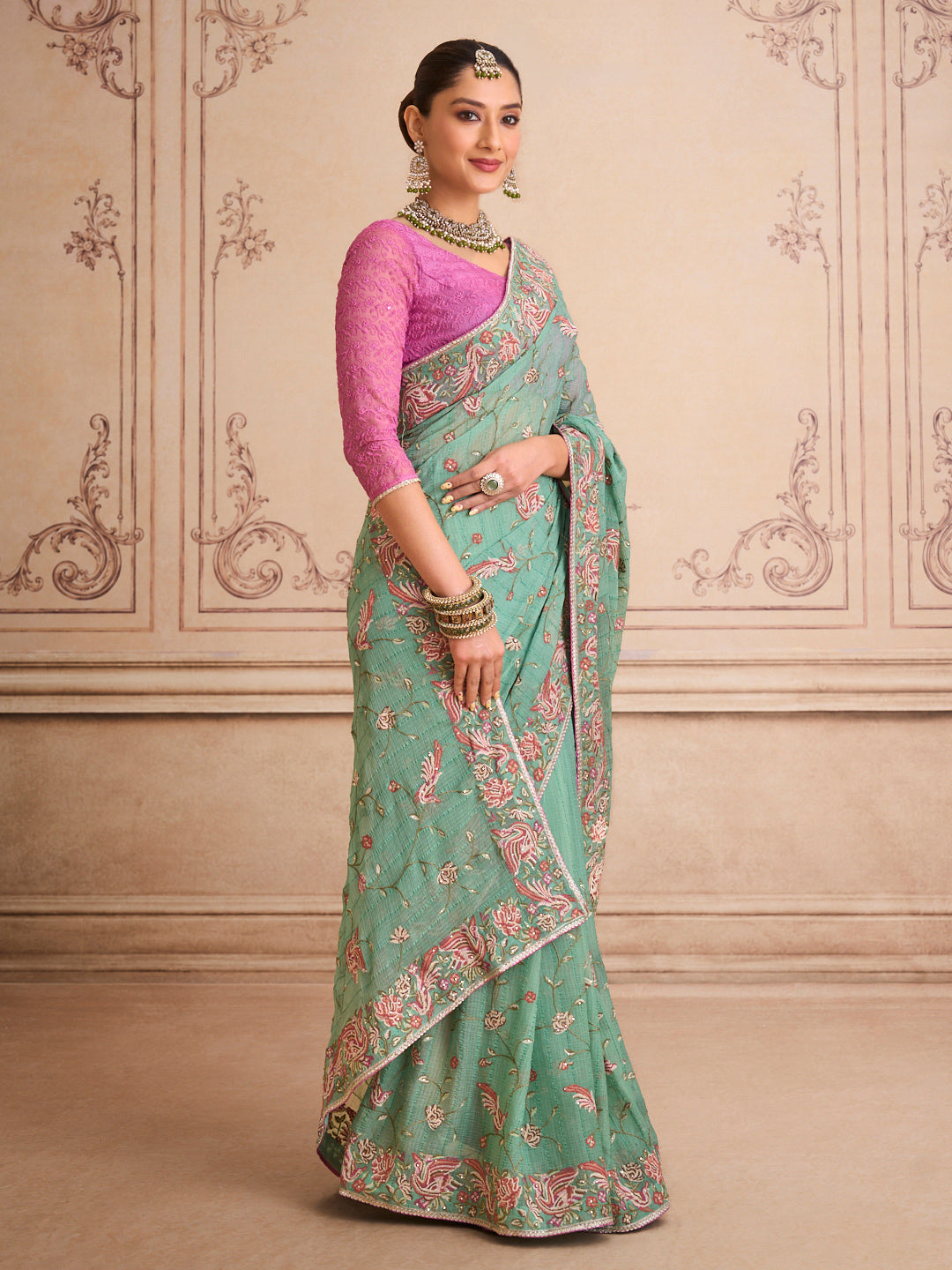 Green embroidered chiffon saree casual wear