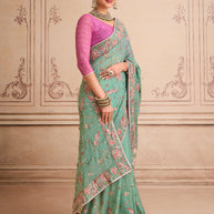 Green embroidered chiffon saree casual wear