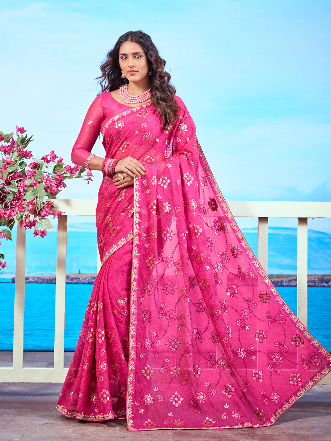 Pink floral embroidered chiffon saree festive wear | Pink gold floral embroidered chiffon saree party wear | Pink floral motif chiffon saree elegant wear | Pink sequin embroidered chiffon saree occasion wear | Pink embroidered border chiffon saree work wear