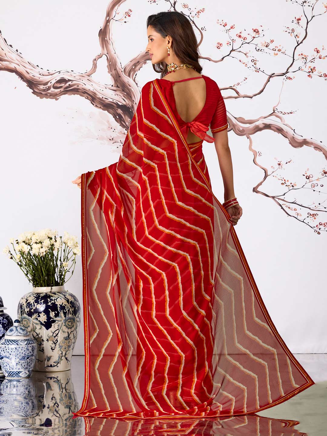 Red leheriya printed georgette saree casual wear