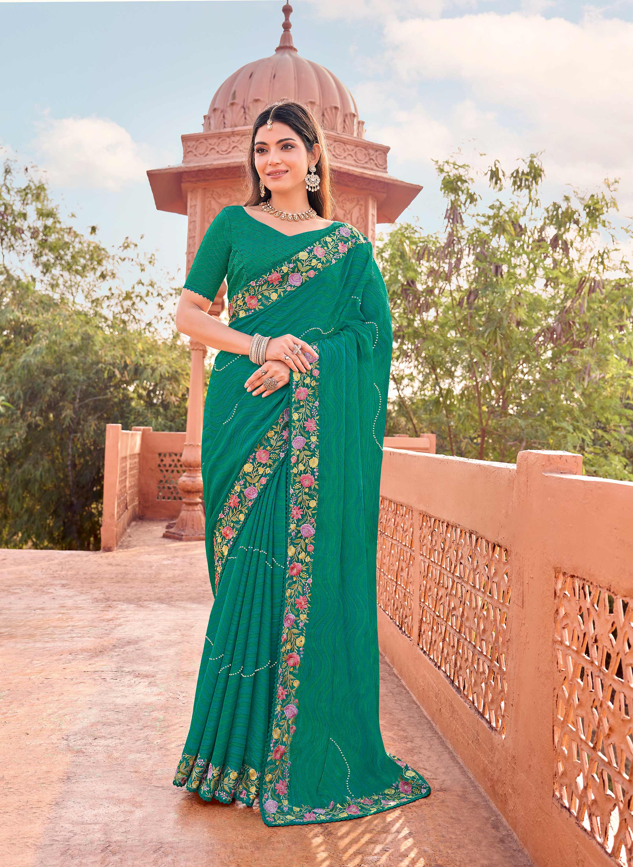 Green chiffon wavy print saree with embroidery
