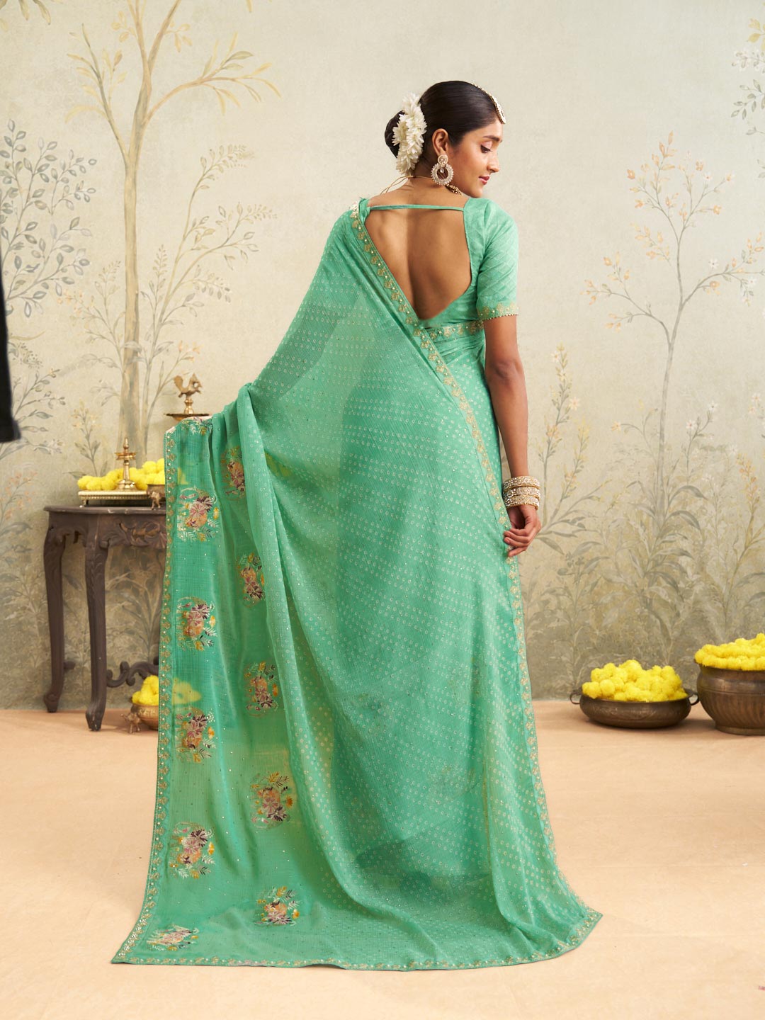Green embroidered chiffon saree party wear