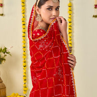 Red bandhani printed georgette saree wedding wear