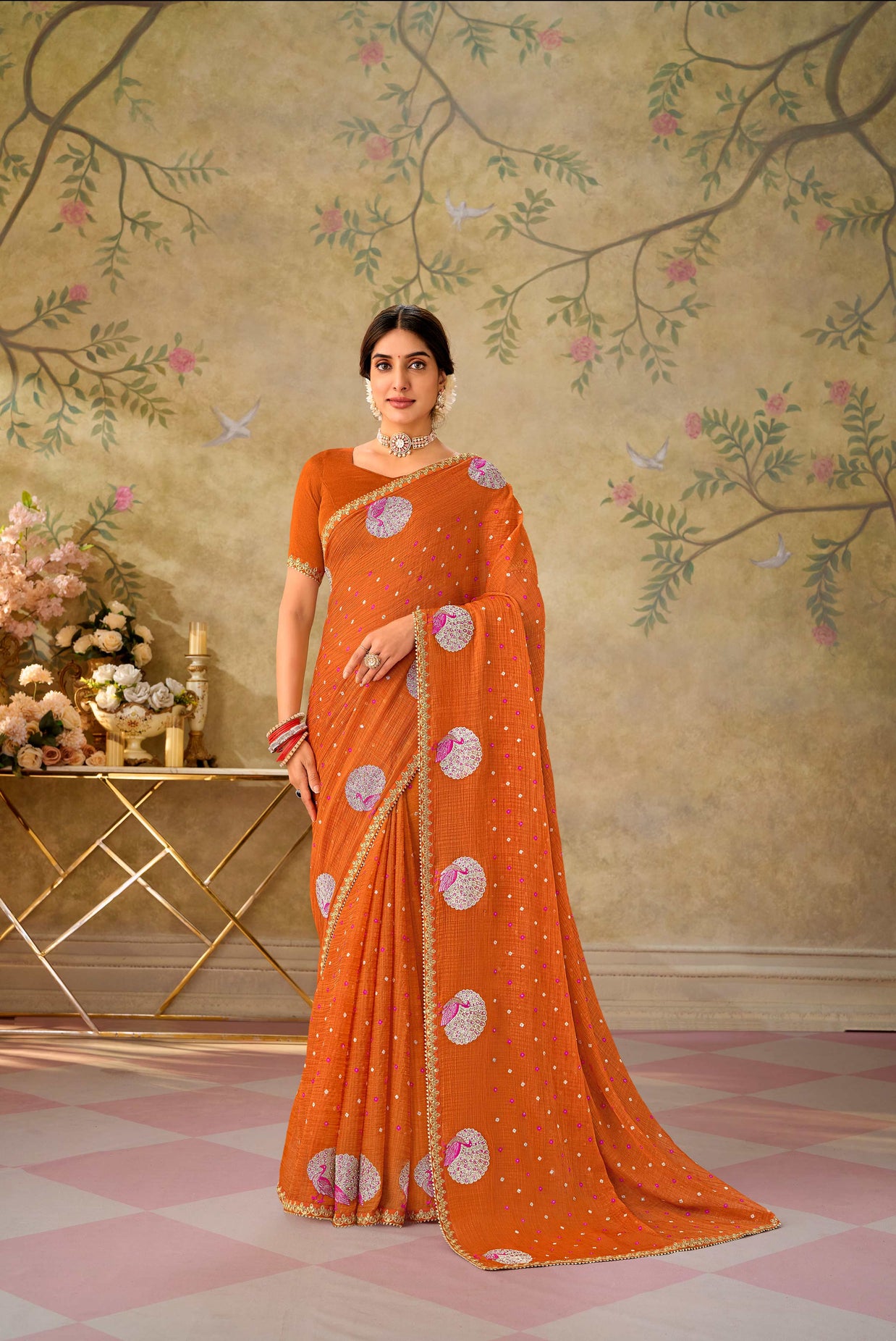Orange embroidered chiffon saree party wear