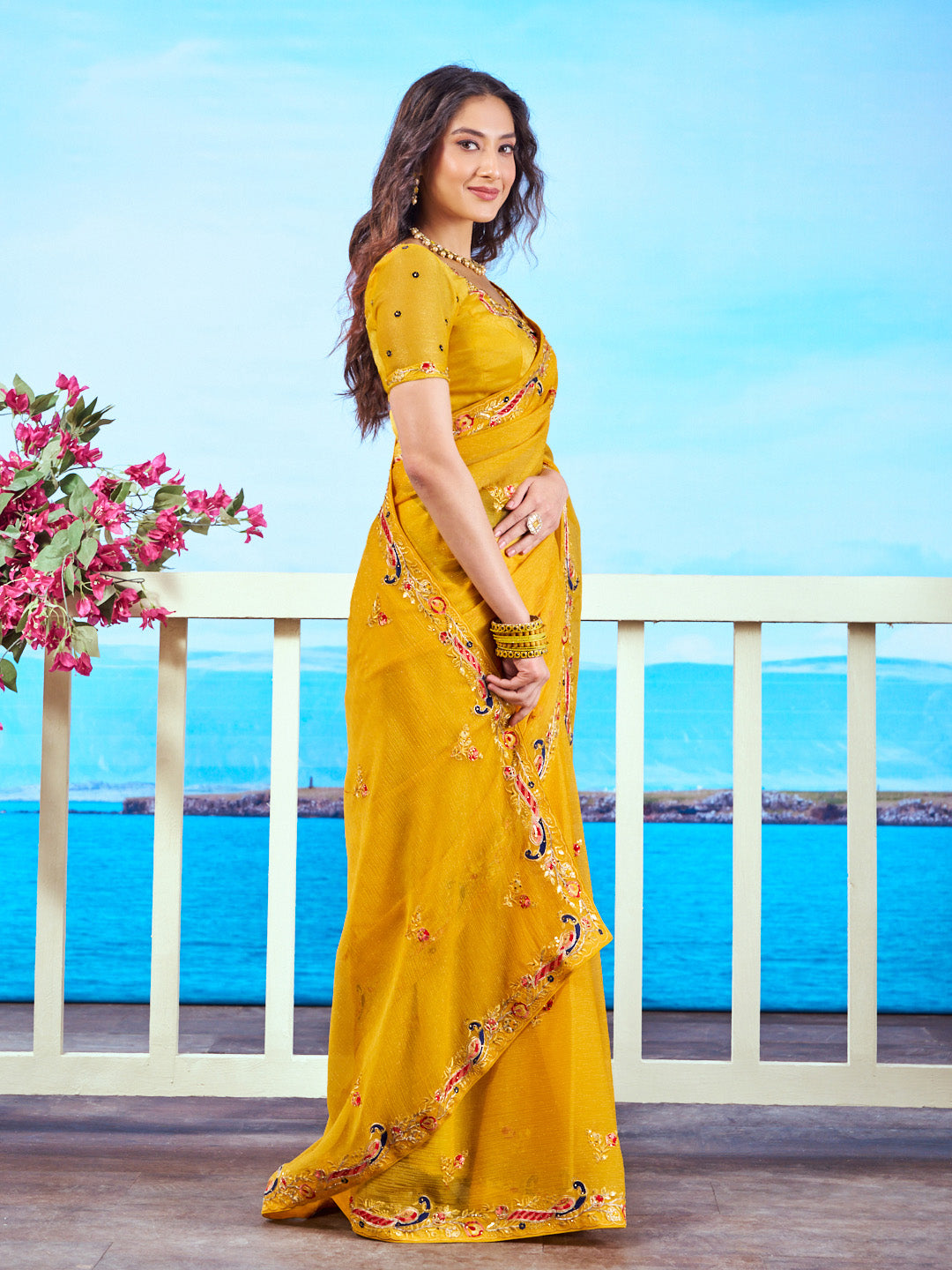 Yellow peacock embroidered chiffon saree wedding wear 