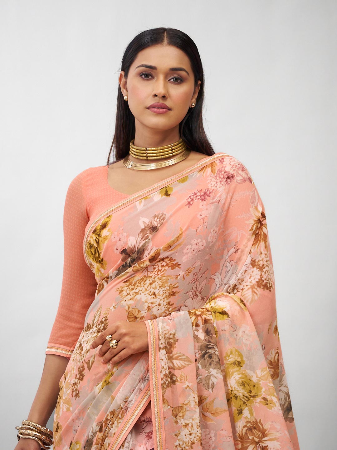 Orange floral georgette saree trendy look
