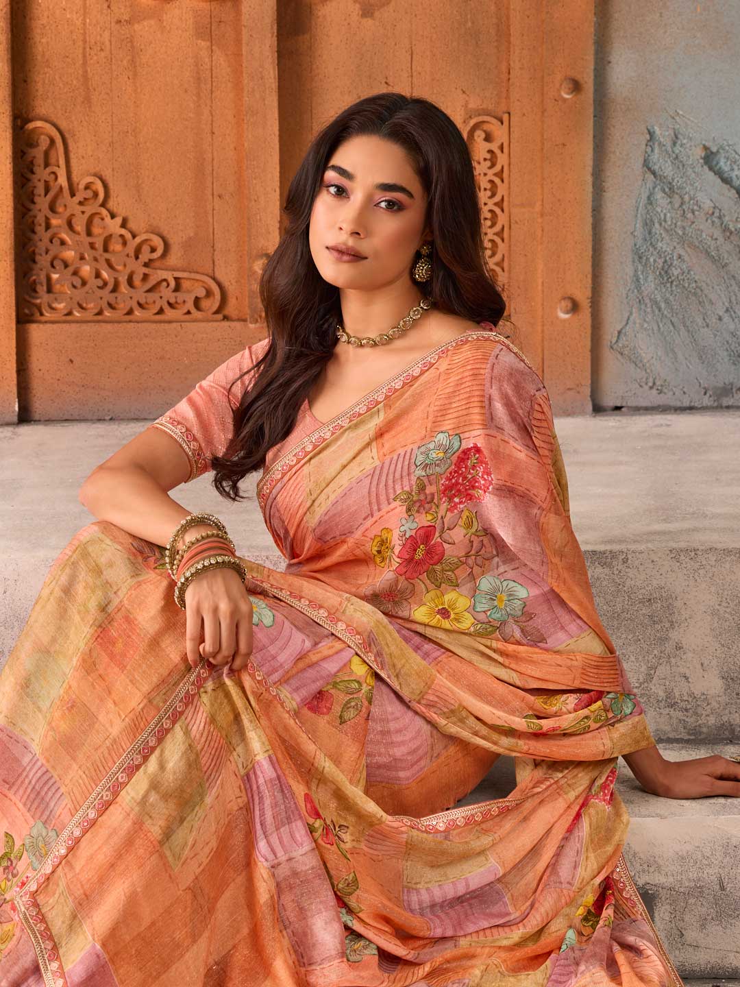 Orange multi-colored floral printed chiffon saree wedding wear