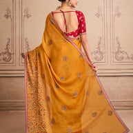 Orange floral embroidered chiffon saree festive wear