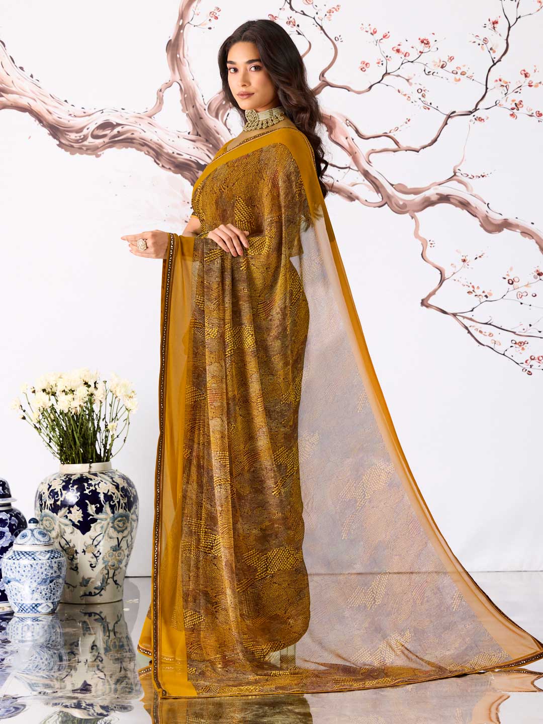 Brown dotted printed georgette saree party wear