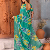 Blue geometric leaf printed chiffon saree festive wear