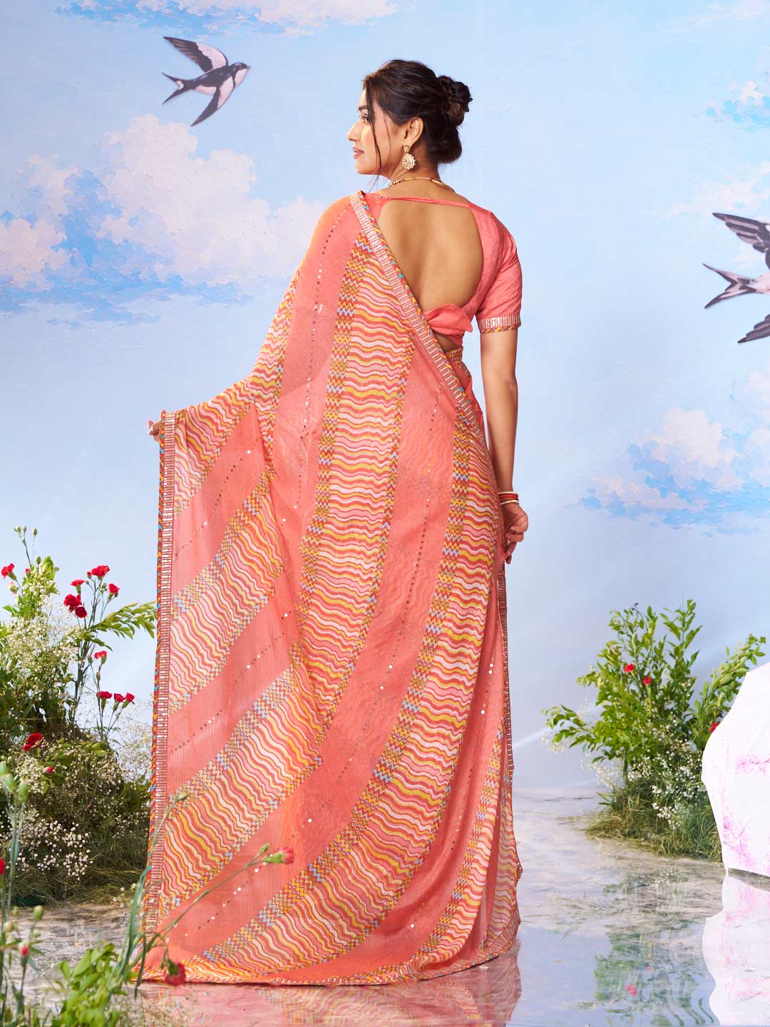 Orange wavy printed chiffon saree casual wear 
