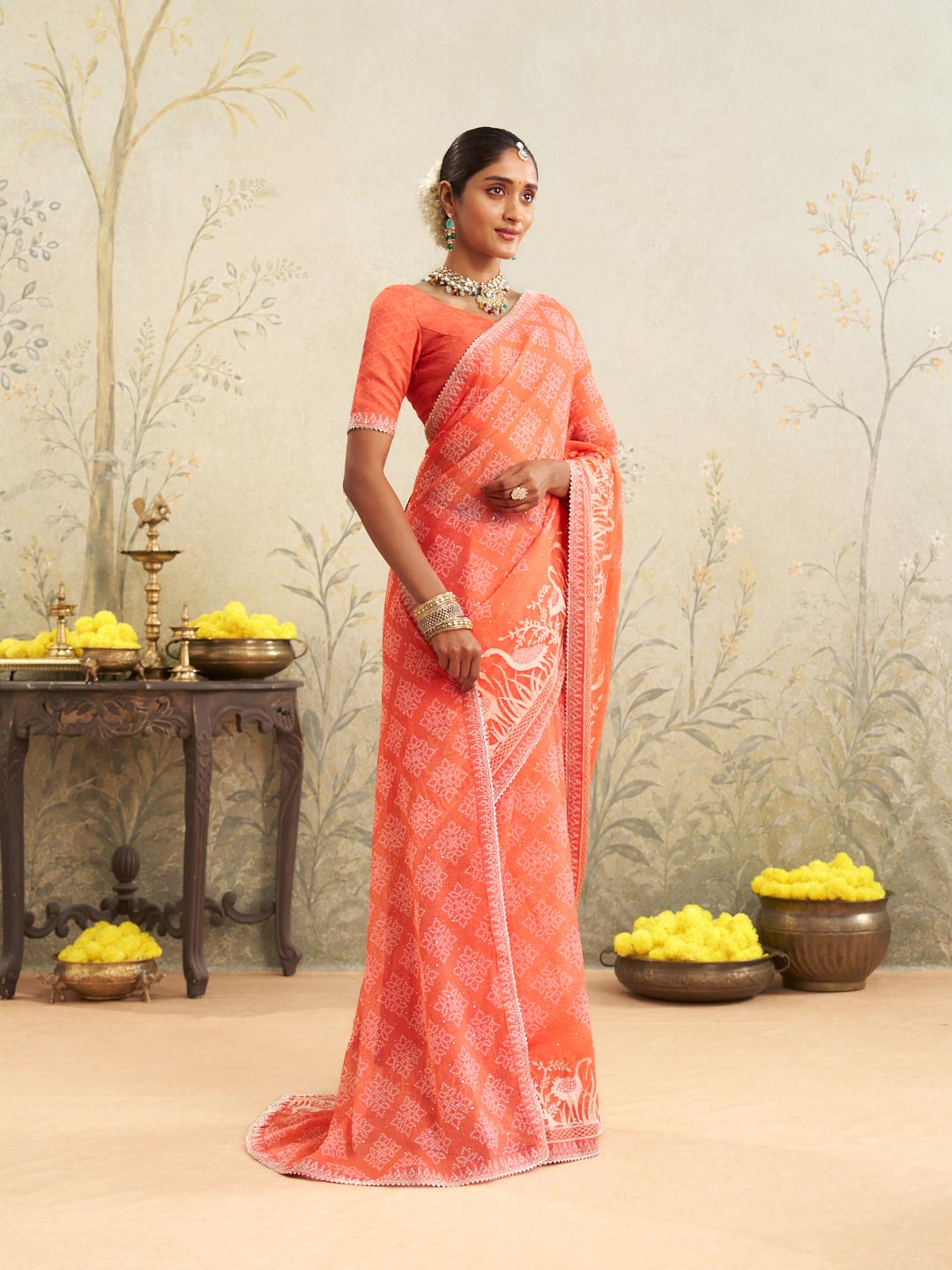 Orange embroidered chiffon saree casual wear